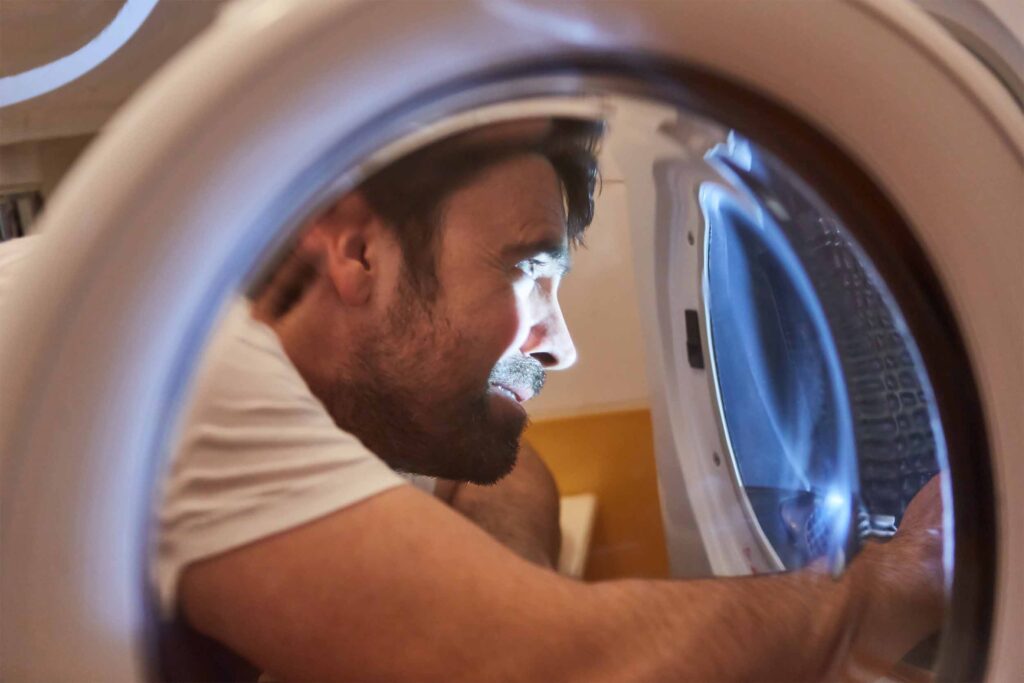 Servicing commercial tumble dryer